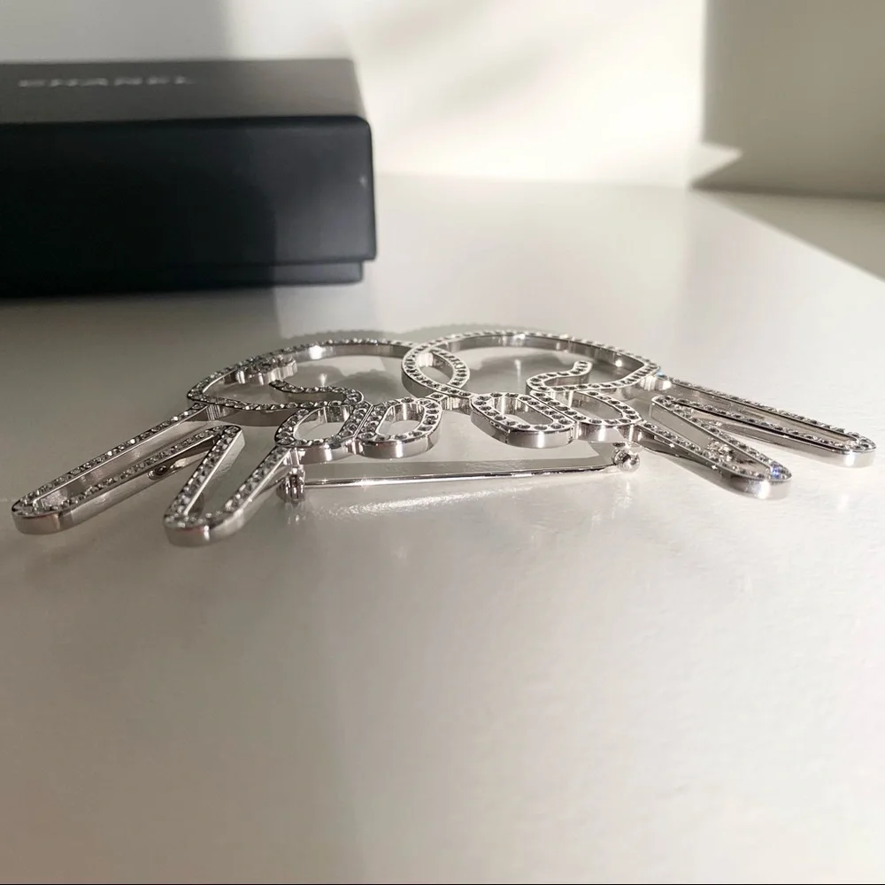 Chanel large peace hands pin